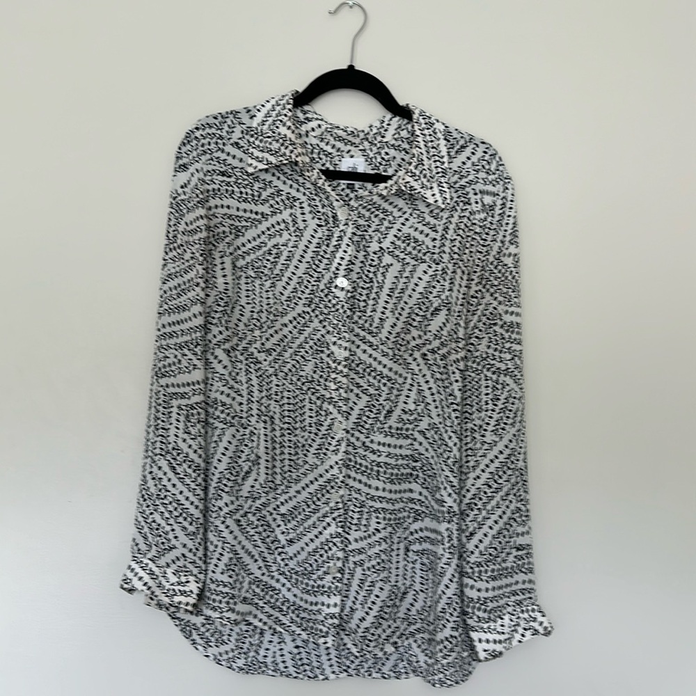 Cabi Split-back blouse in white with black print. Size M.